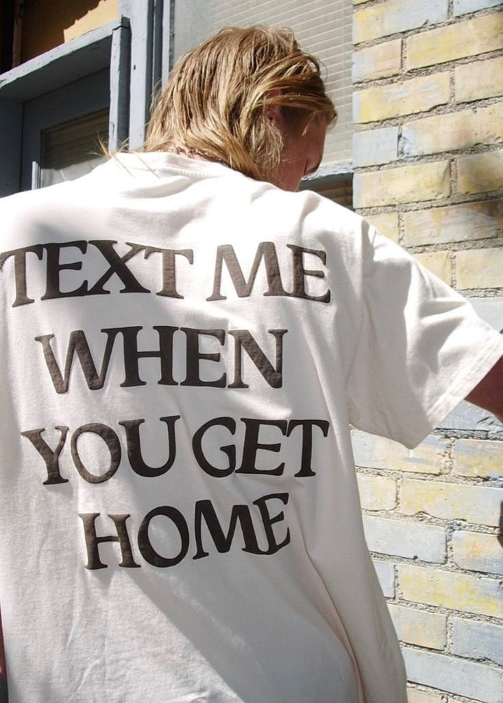 T-shirt oversize "Texte-moi quand tu rentres"